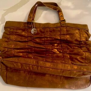The Sak Brown and Gold Shoulder Bag with Distressed Leather